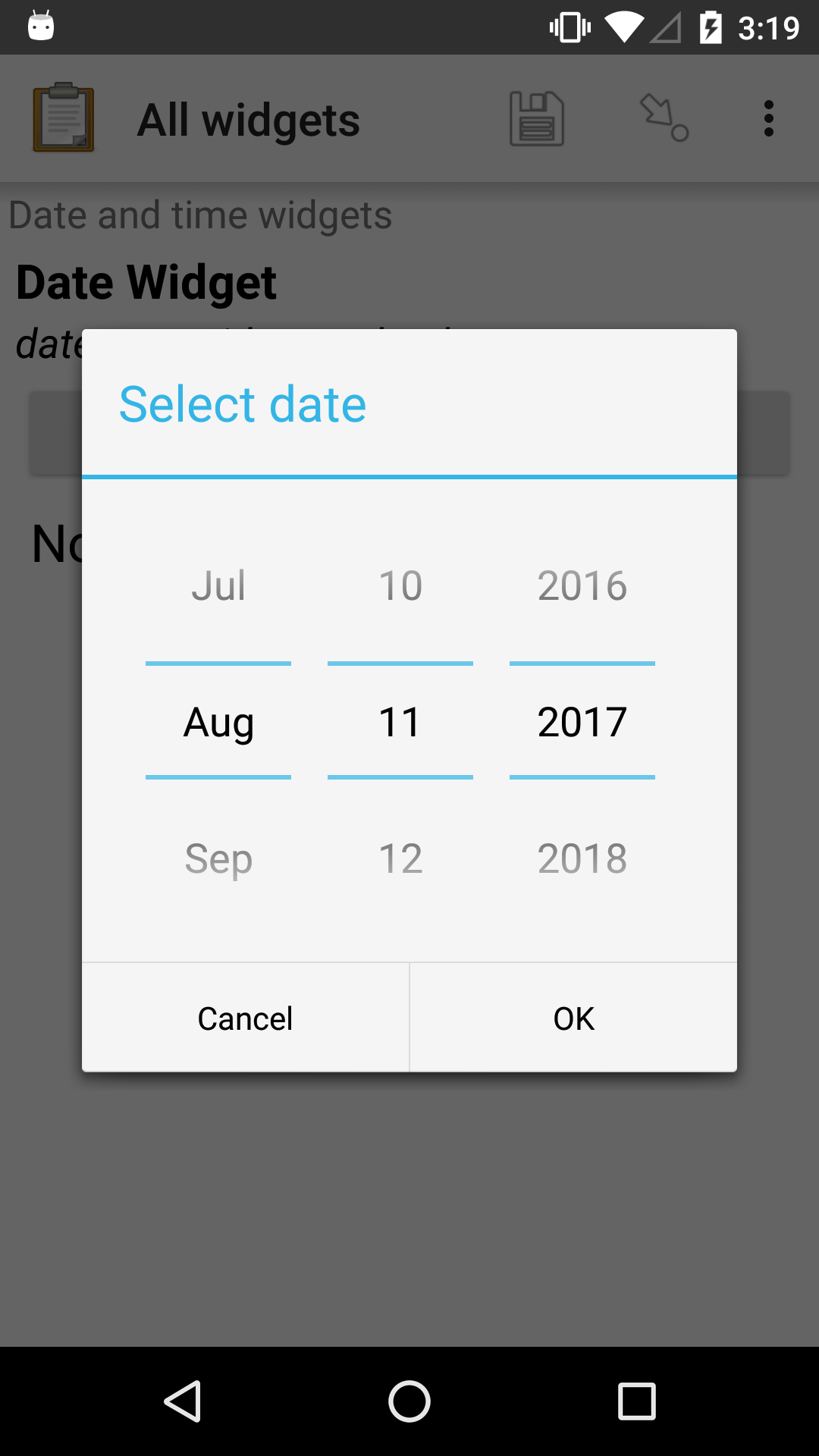 The date widget shown previously, with a pop modal. The headline of the modal is "Select date." There are individual "spinner" style selectors for month, day, and year. At the bottom of the modal are OK and Cancel buttons.