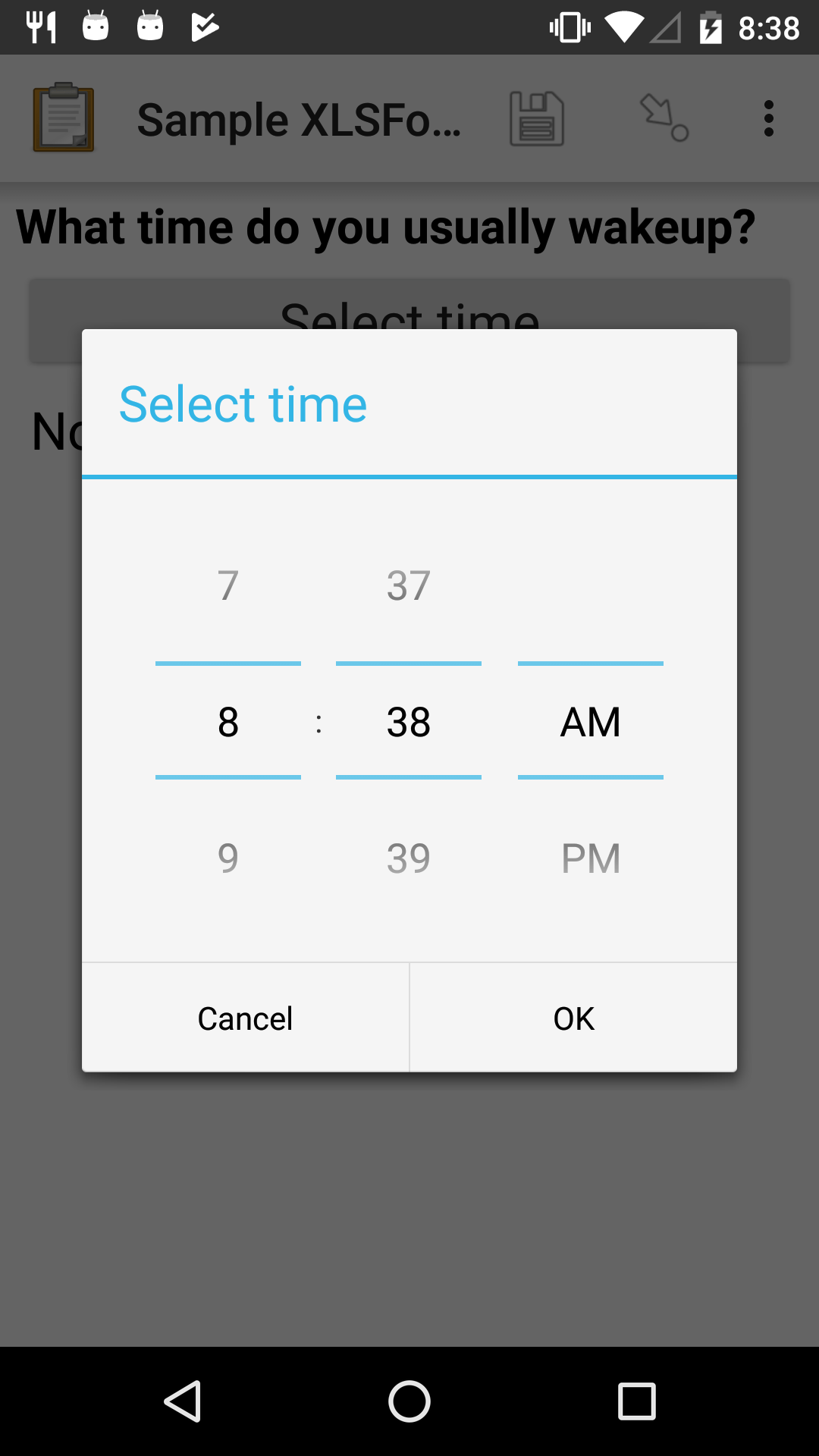 The Time widget as displayed previously, with a modal popup. The modal headline is "Select time." The body of the modal contains scrollers for Hour, Minute, and AM/PM. At the bottom of the modal are Cancel and OK buttons.